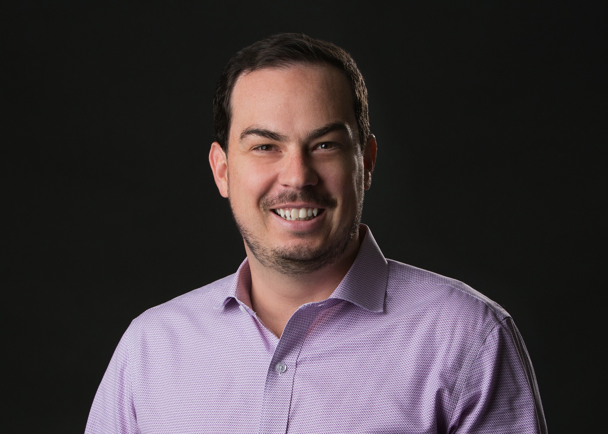 Headshot of male engineer and principal.