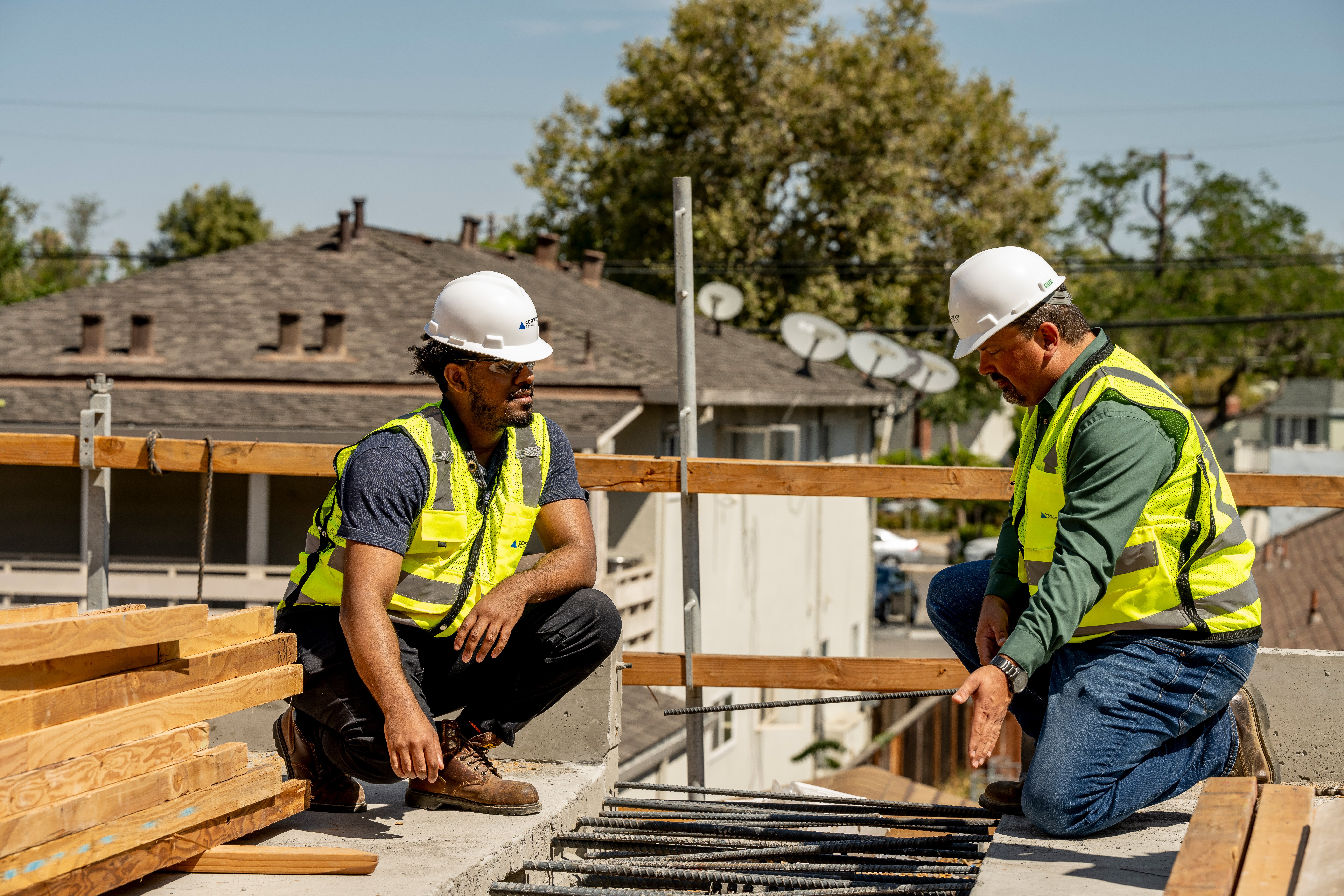 Engineers working on job site.